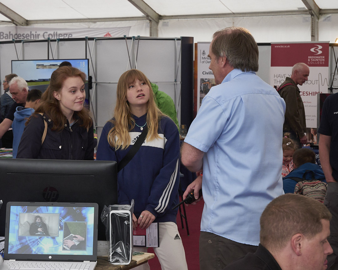 Andrew G7KNA (R) showing amateur radio to visitors