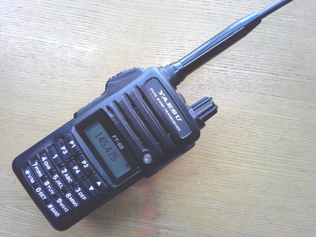 The author's FT-65 and Diamond SRJ77CA antenna